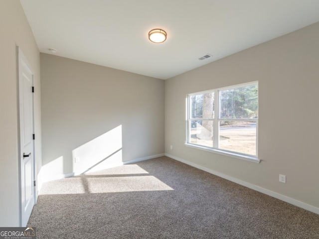 4392 Navajo Ln SE, Acworth, GA 30102 - carpeted empty room featuring baseboards and visible vents