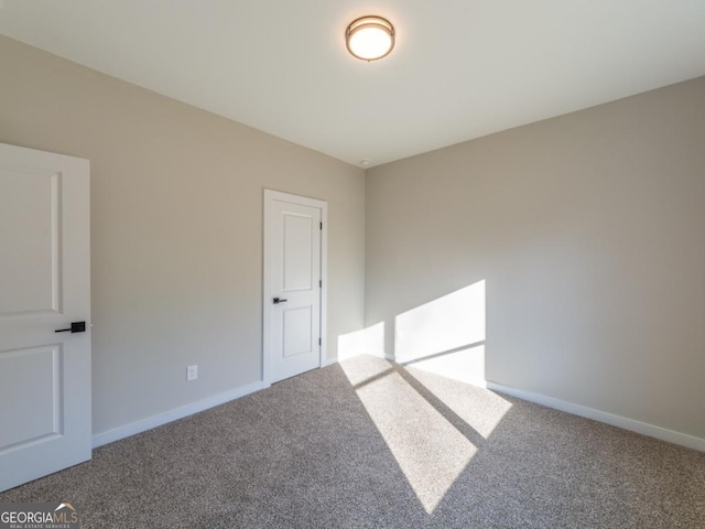 4392 Navajo Ln SE, Acworth, GA 30102 - spare room with carpet flooring and baseboards