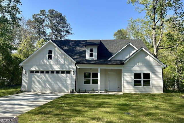 4392 Navajo Ln SE, Acworth, GA 30102 - modern inspired farmhouse featuring driveway, board and batten siding, a shingled roof, and a front yard