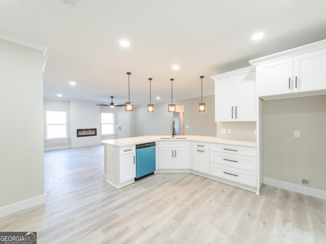 4392 Navajo Ln SE, Acworth, GA 30102 - kitchen featuring light wood finished floors, a peninsula, a sink, open floor plan, and dishwasher