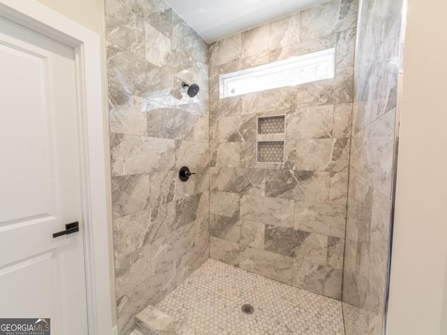 4392 Navajo Ln SE, Acworth, GA 30102 - bathroom featuring a tile shower