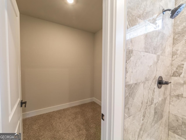 4392 Navajo Ln SE, Acworth, GA 30102 - bathroom with a tile shower and baseboards