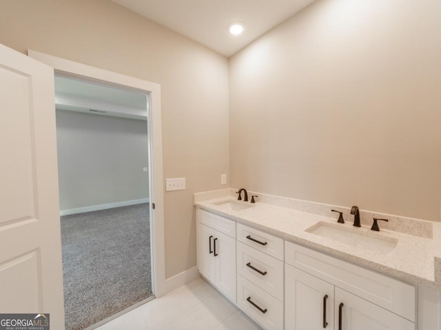 4392 Navajo Ln SE, Acworth, GA 30102 - bathroom with baseboards, a sink, recessed lighting, and double vanity