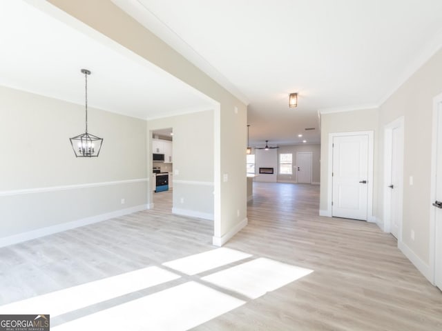 4392 Navajo Ln SE, Acworth, GA 30102 - empty room with light wood-type flooring, baseboards, and ornamental molding