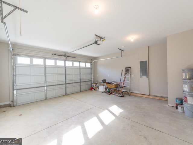 4392 Navajo Ln SE, Acworth, GA 30102 - garage with electric panel and a garage door opener