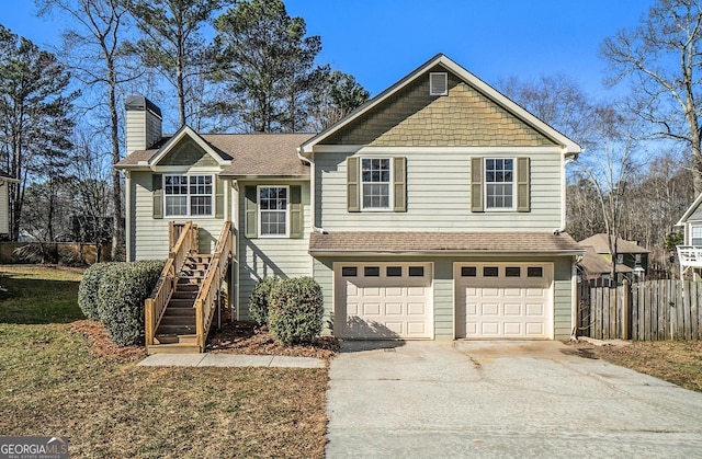 view of front of property featuring a garage