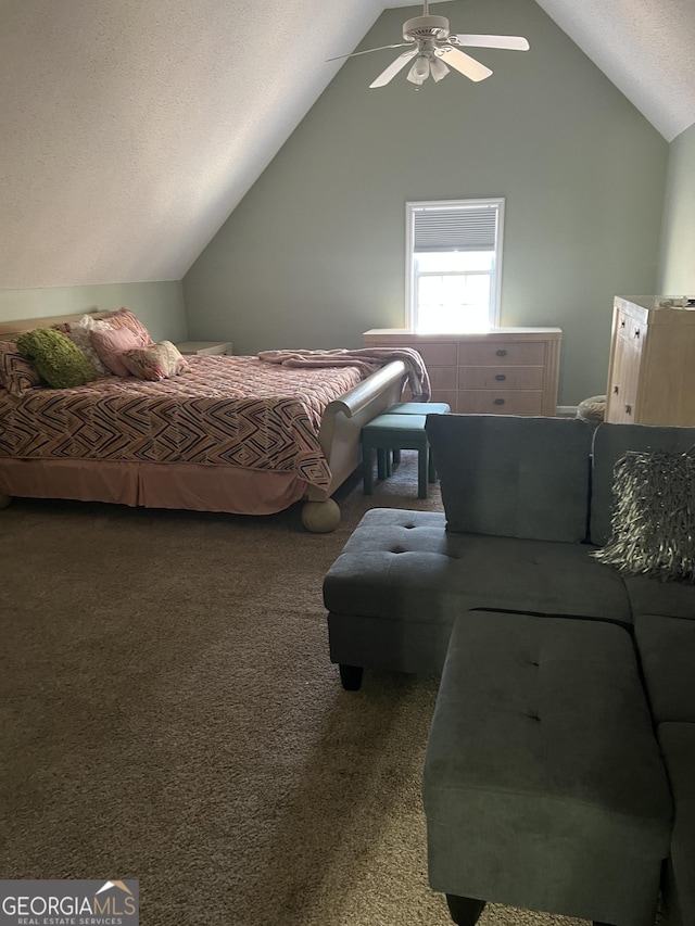 carpeted bedroom with a textured ceiling, ceiling fan, and lofted ceiling