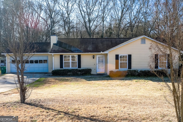 single story home featuring a front lawn and a garage