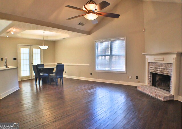 kitchen featuring stainless steel refrigerator with ice dispenser, dark hardwood / wood-style floors, and white cabinets