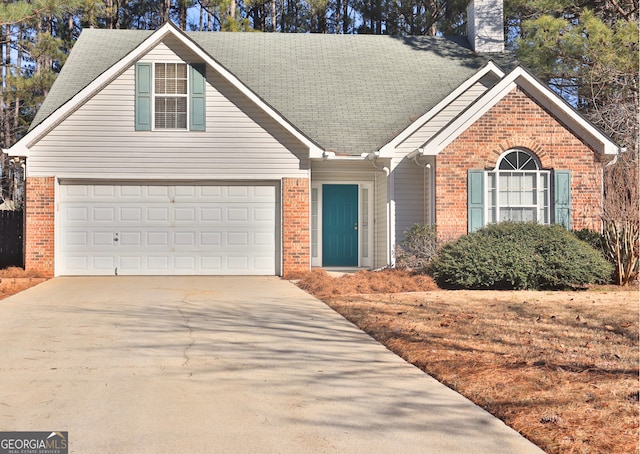 front of property with a garage