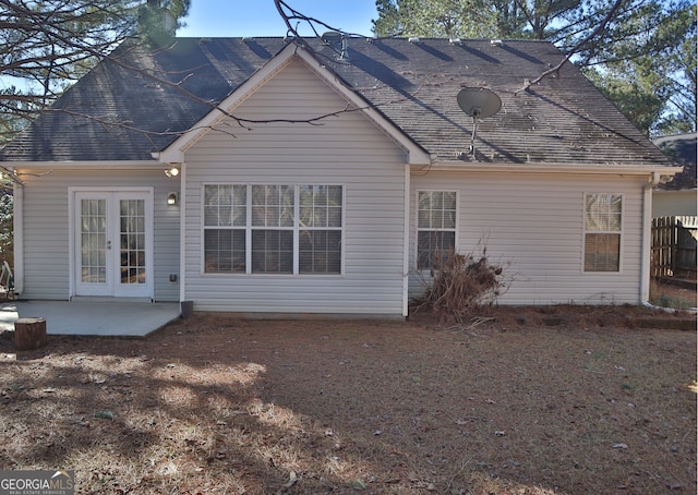 rear view of house with a patio area and french doors