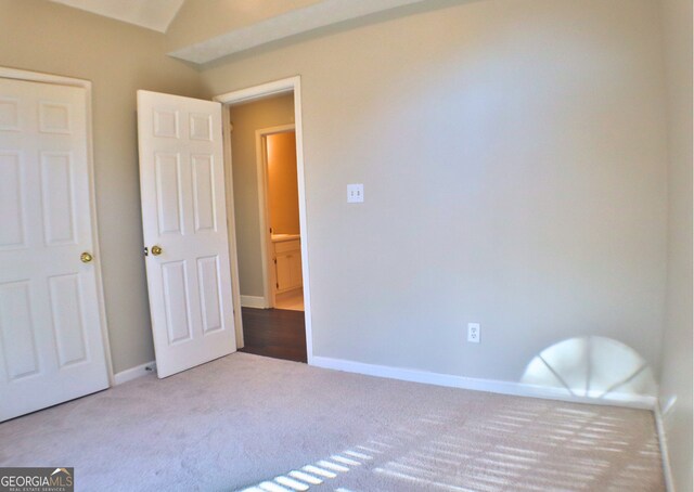 unfurnished bedroom with carpet