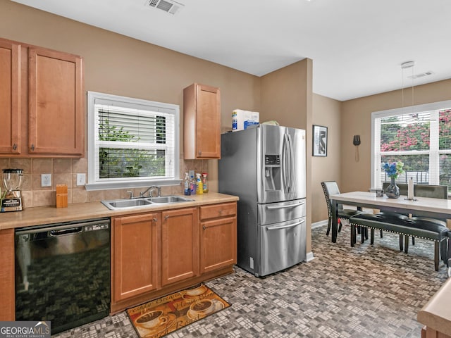 kitchen featuring black dishwasher, sink, backsplash, hanging light fixtures, and stainless steel fridge with ice dispenser