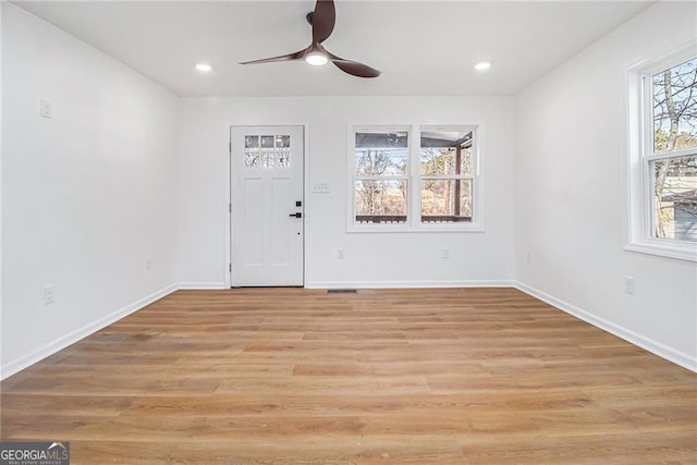 entrance foyer featuring ceiling fan and light hardwood / wood-style flooring