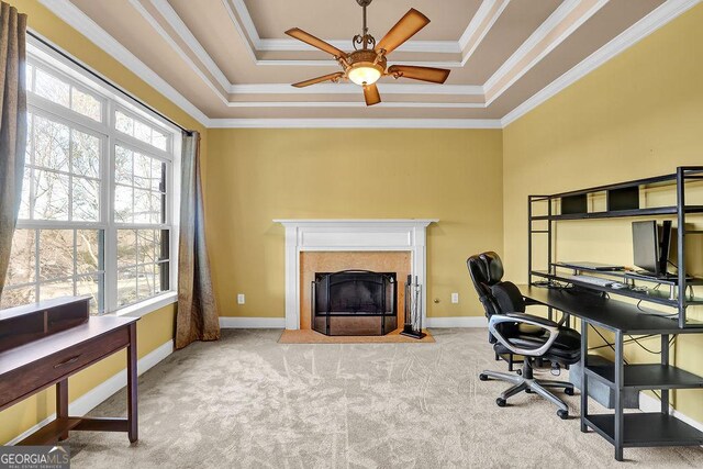 bedroom with ceiling fan, ornamental molding, and a raised ceiling