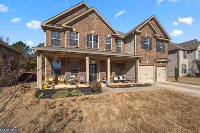 craftsman house with covered porch and a garage