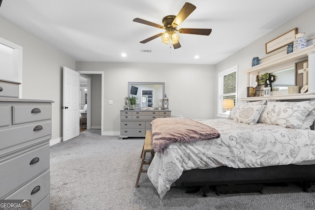 carpeted bedroom with ceiling fan