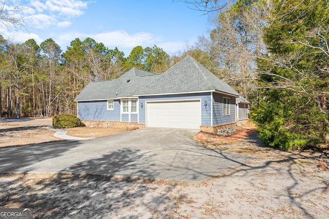 view of home's exterior with a garage