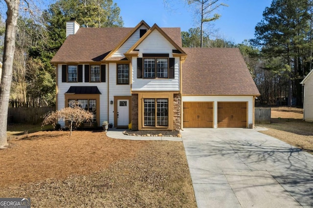 view of front of property with a garage