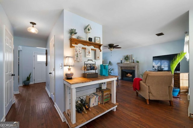 hall with dark hardwood / wood-style flooring