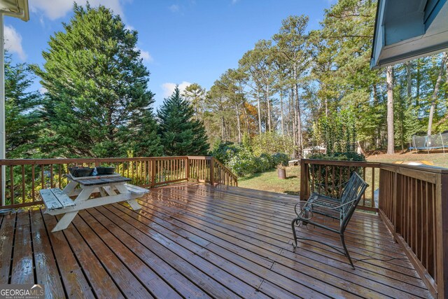 deck with a trampoline