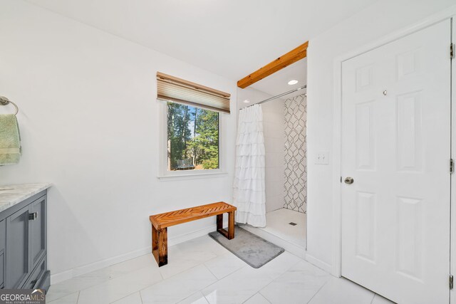 walk in closet featuring light carpet