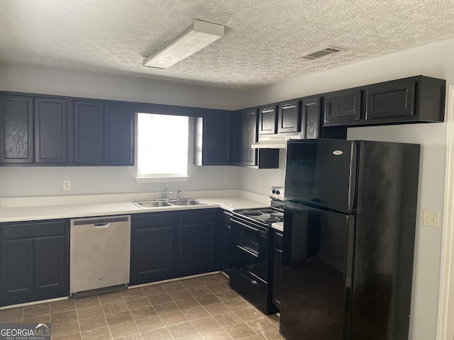 kitchen with under cabinet range hood, a sink, visible vents, light countertops, and black appliances