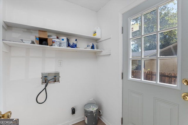 laundry area with washer hookup and electric dryer hookup