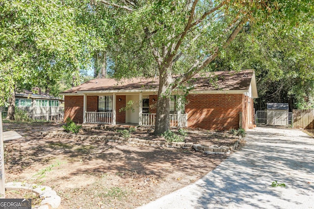 view of front of property featuring covered porch