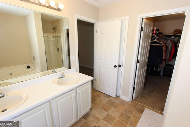 bathroom featuring plus walk in shower and vanity