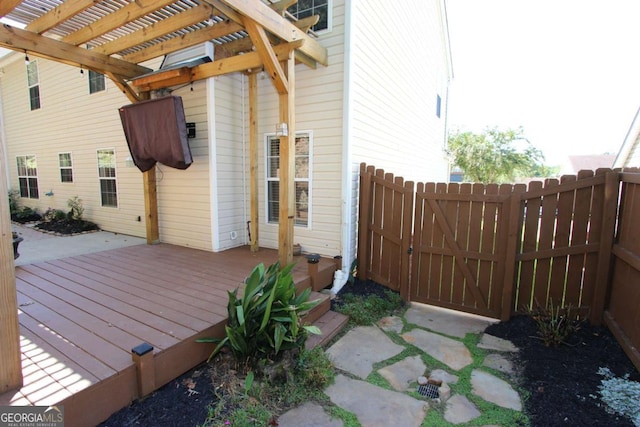 wooden deck with a pergola