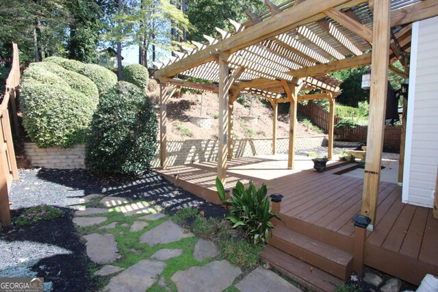 wooden deck with a pergola