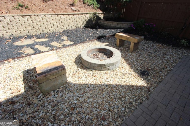 view of yard featuring a fire pit