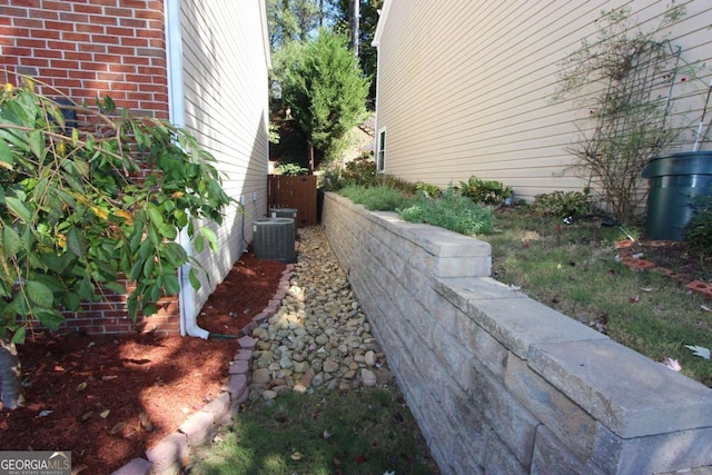 view of property exterior featuring central AC unit