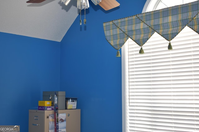 interior space with a ceiling fan