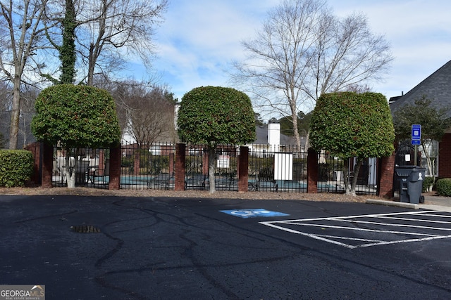 uncovered parking lot with fence