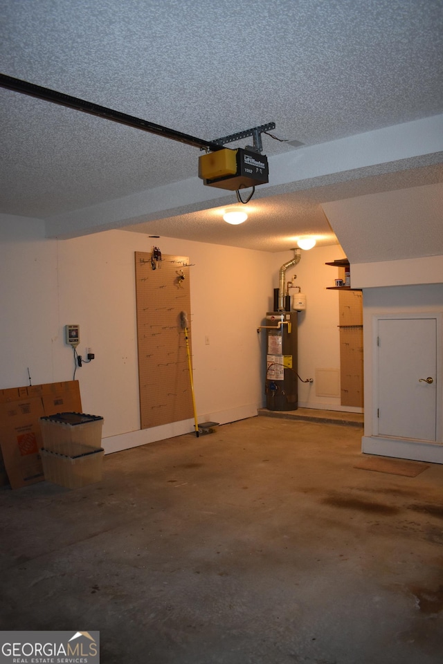 garage featuring a garage door opener and water heater