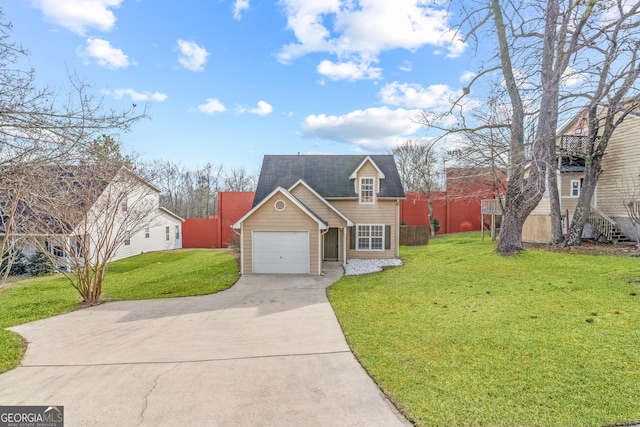 view of front facade with a garage and a front yard