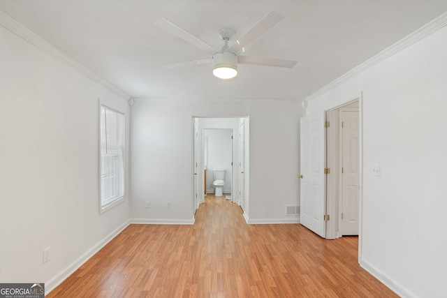 unfurnished room featuring ceiling fan, ornamental molding, and light wood-type flooring