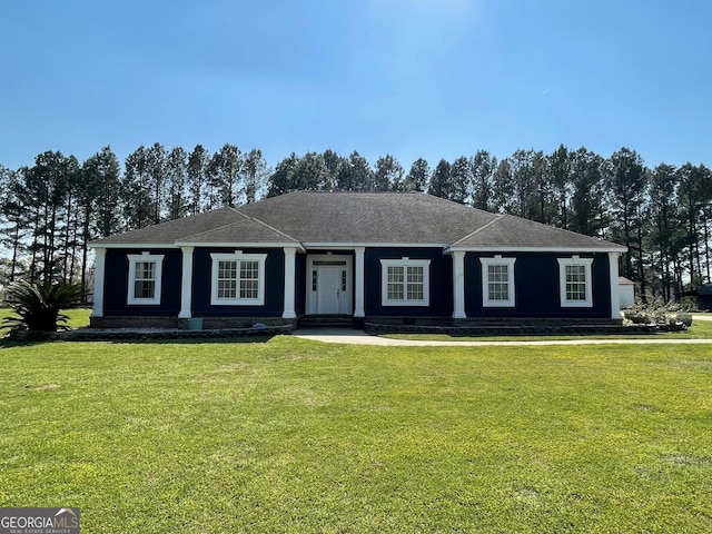 single story home with a front yard