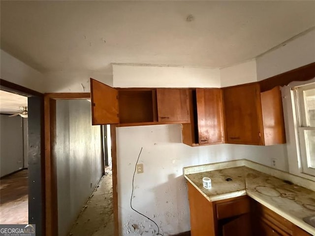 kitchen featuring ceiling fan