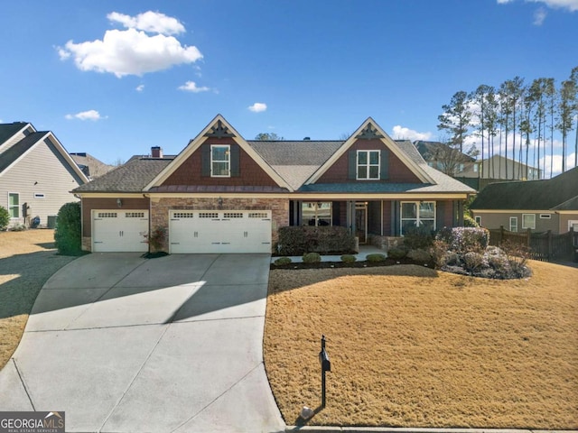 craftsman house with a garage