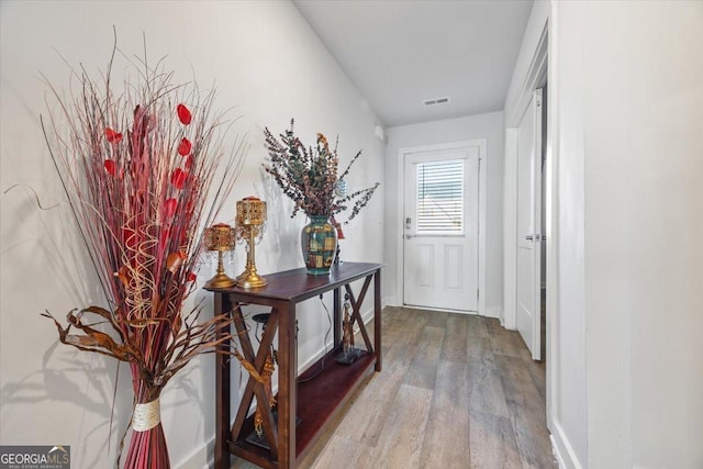 doorway featuring hardwood / wood-style floors