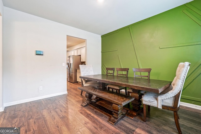 dining room featuring dark hardwood / wood-style flooring