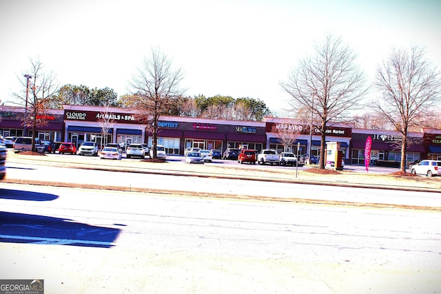 view of street featuring curbs and sidewalks