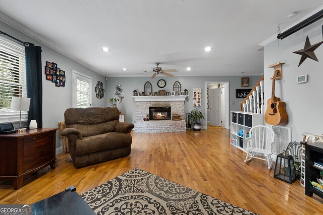 home office featuring beam ceiling, light hardwood / wood-style flooring, and a textured ceiling