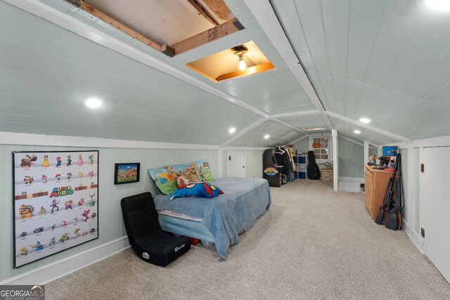 bedroom featuring light colored carpet and ceiling fan