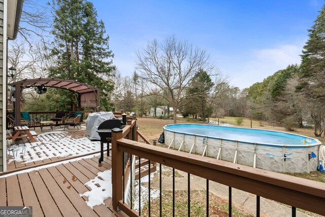 view of yard with a shed and an outdoor fire pit