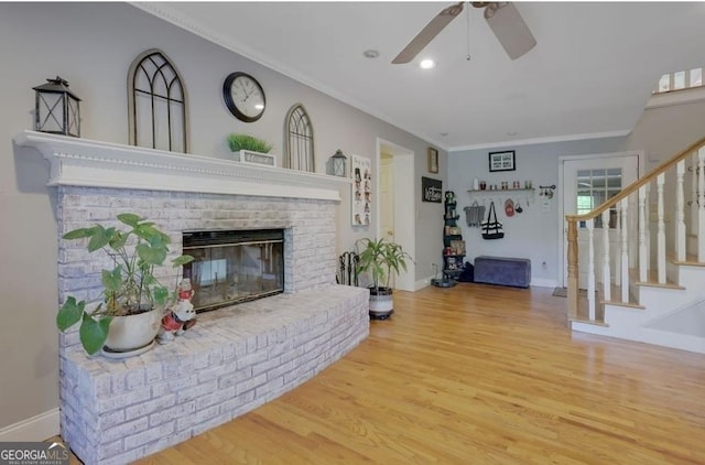 kitchen featuring sink, decorative light fixtures, kitchen peninsula, stainless steel appliances, and white cabinets