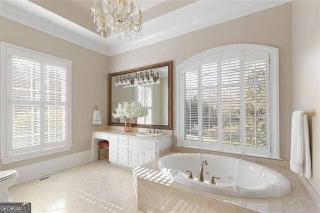 bathroom with vanity, plenty of natural light, a chandelier, and ornamental molding